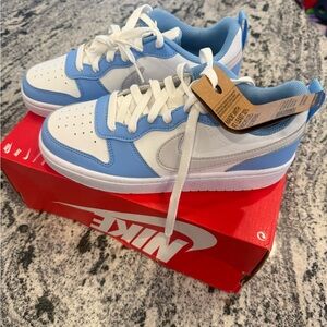 Nike 5Y Women’s 6.5 Blue and White Sneakers 
New with tags, never been worn